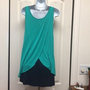 maternity blouse with a cool black lining that hangs in the back.sizeL